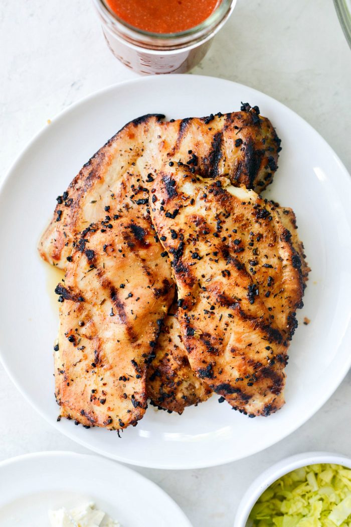 grilled chicken on white plate.