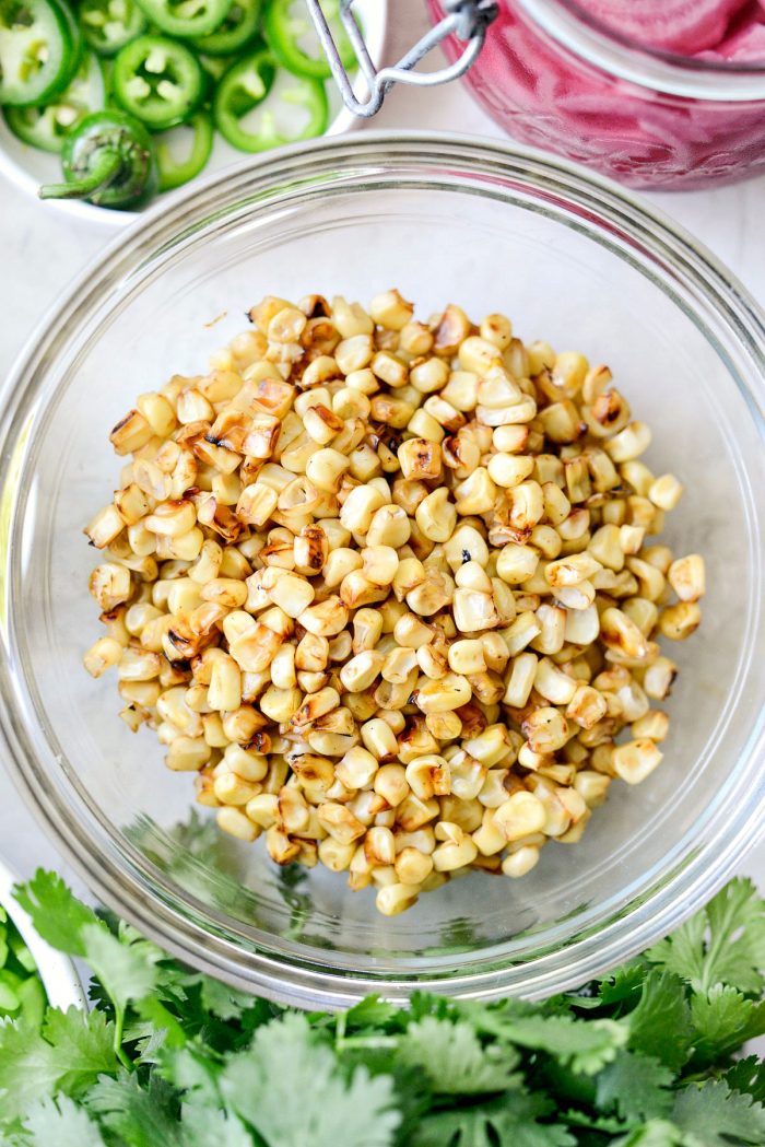 charred sweet corn in glass bowl.