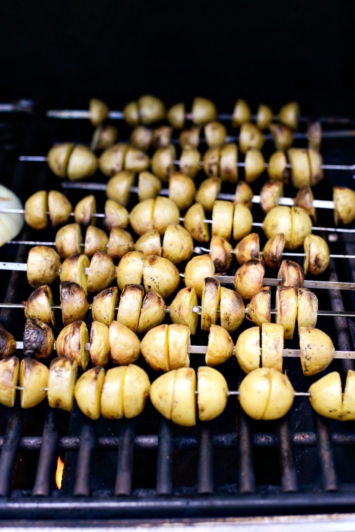 grilled potatoes on metal skewers