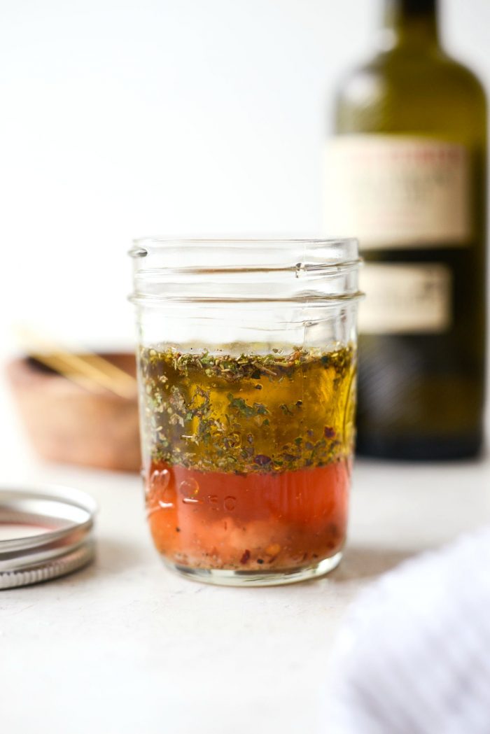 red wine vinegar and olive oil added to jar