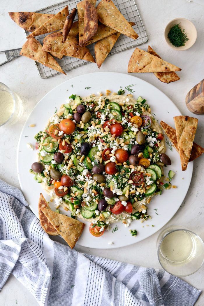 loaded hummus dip served with toasted naan triangles