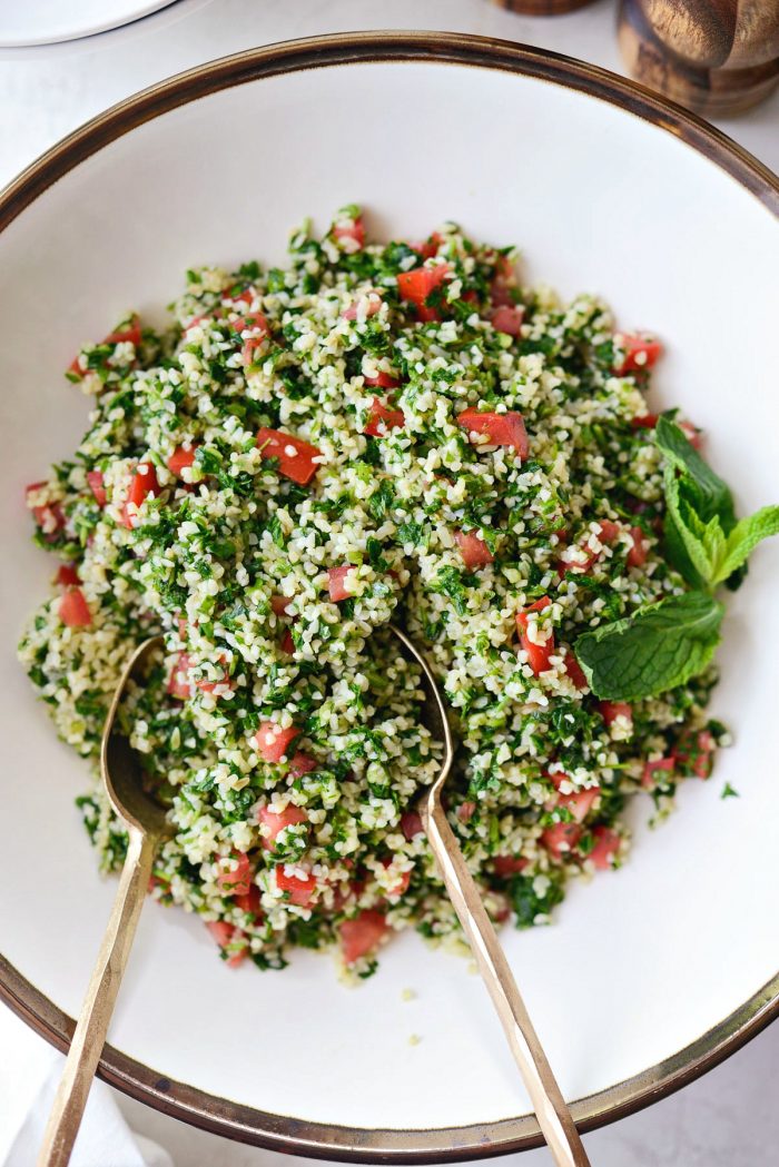 homemade tabbouleh in cream bowl.