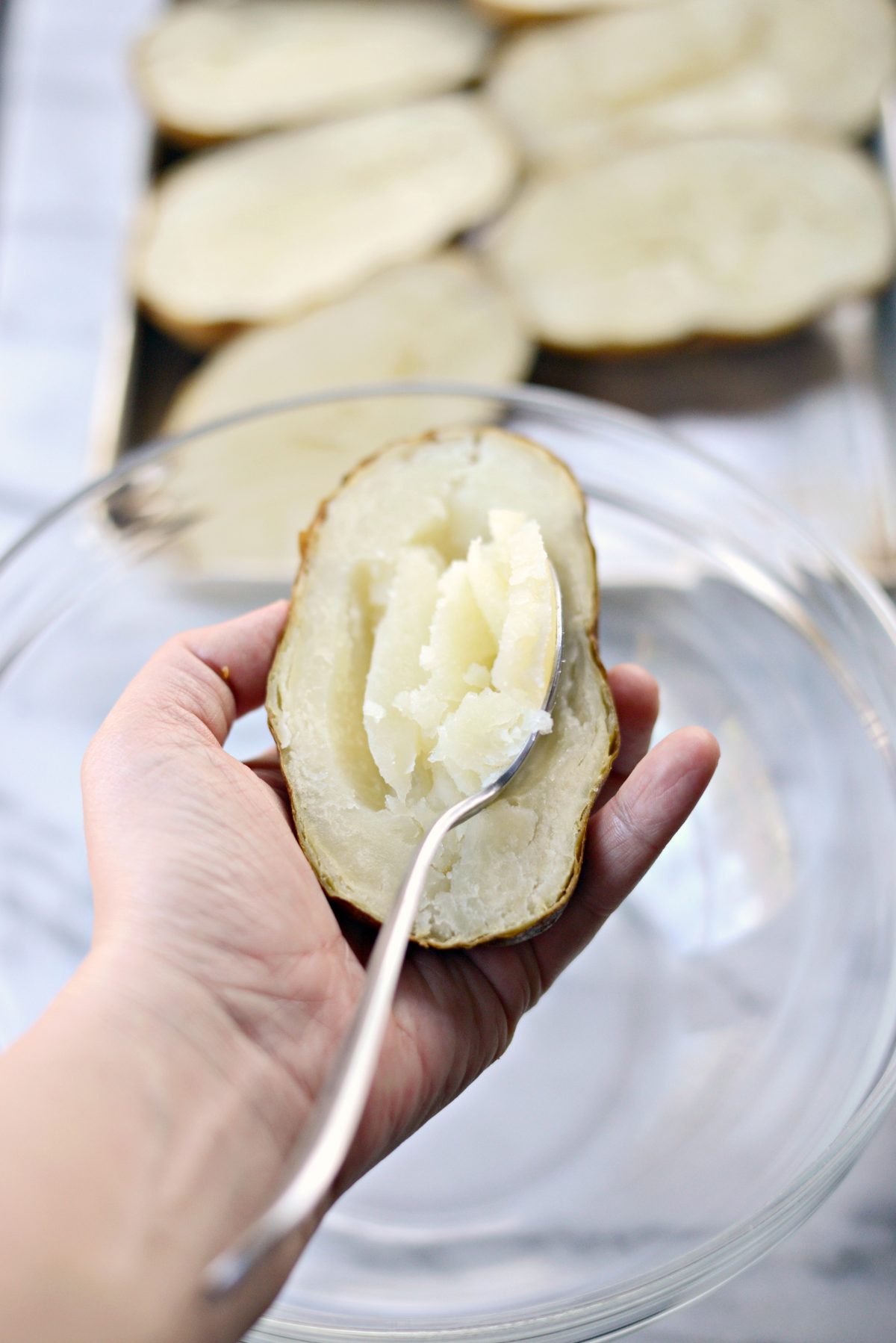 scoop flesh out into a bowl.