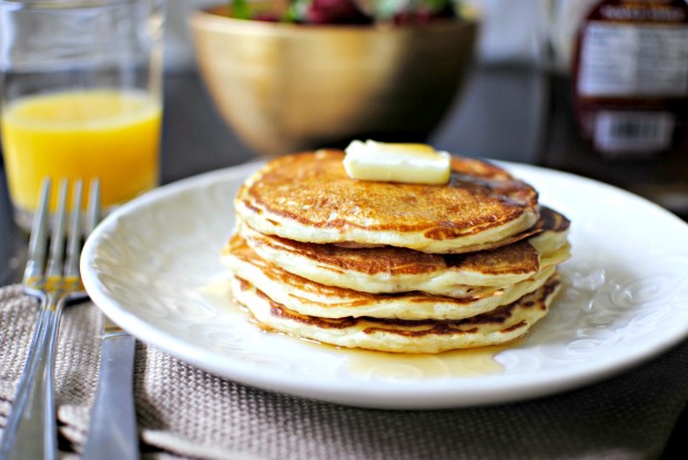 Strawberry Buttermilk Pancakes on plate with butter and syrup