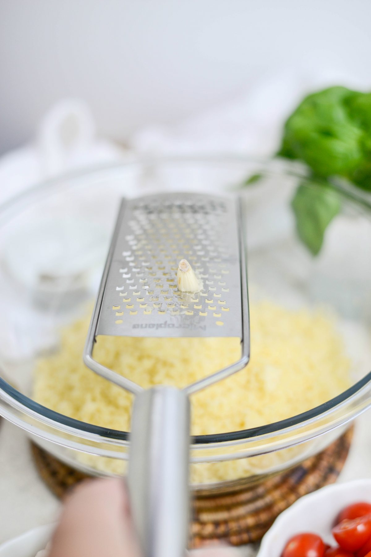 grate in garlic