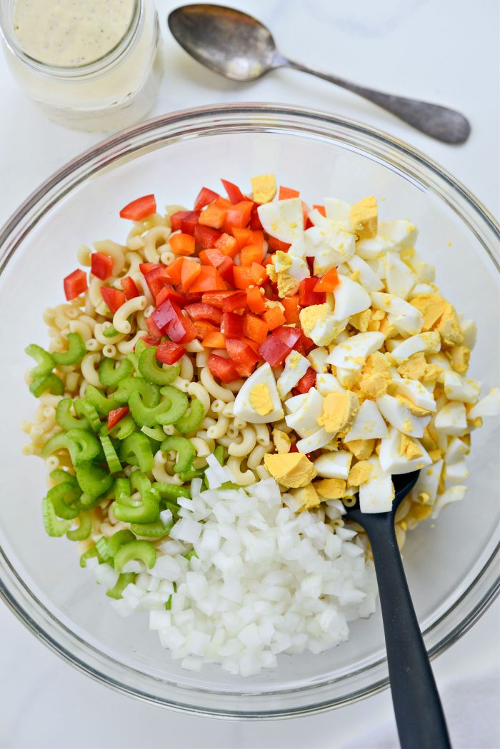 pasta, egg, peppers, onions and celery in a large bowl.