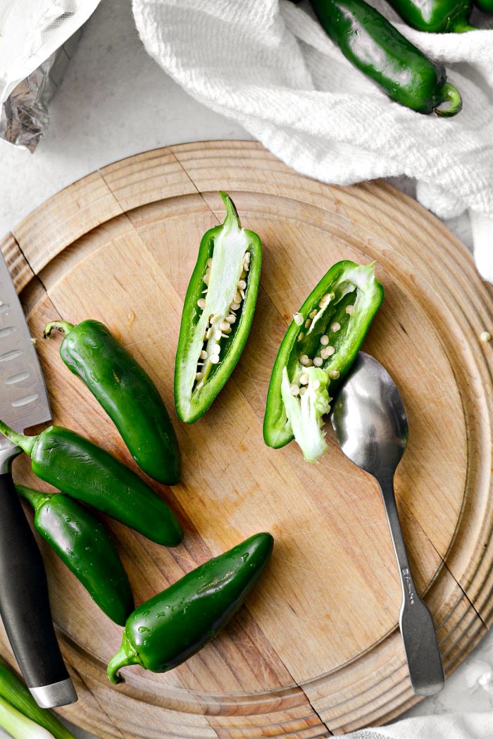 scrape out seeds and ribs with a small spoon