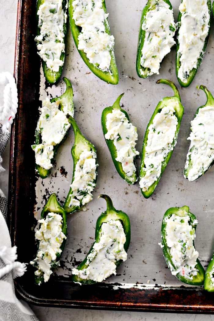 fill jalapeños with cheese mixture