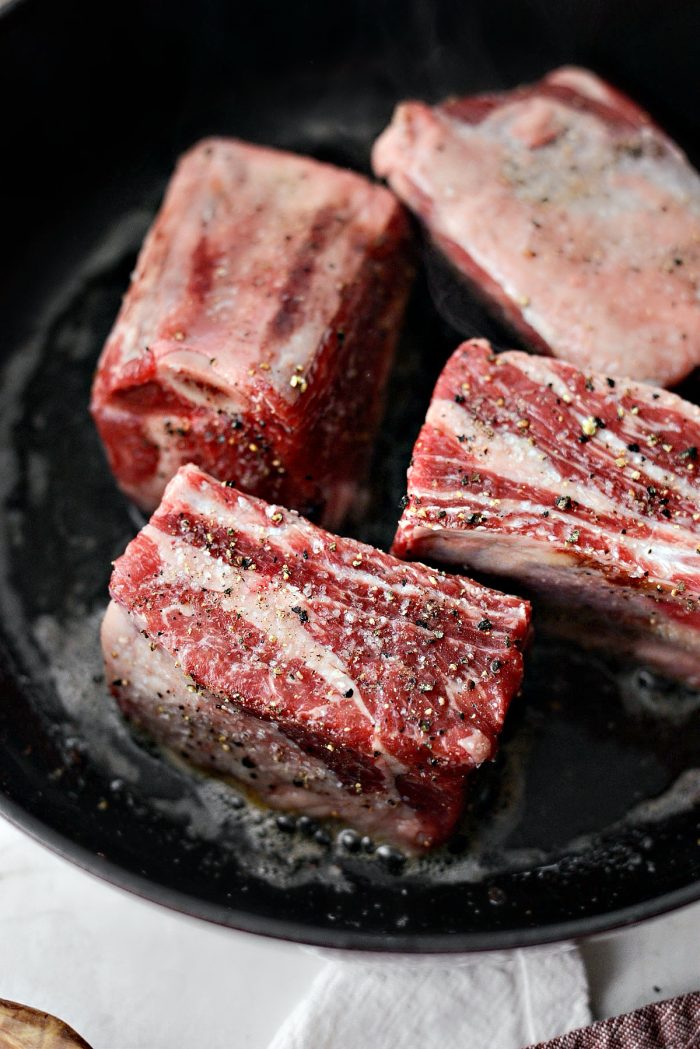 Sear short ribs on all sides