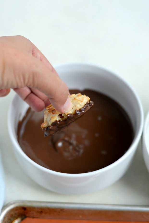 dip bottom of cookies in melted chocolate almond bark.