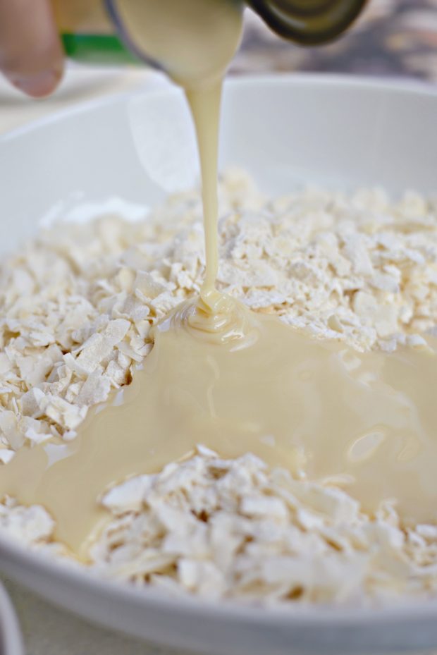 Add in sweetened condensed milk, almond and vanilla extract
