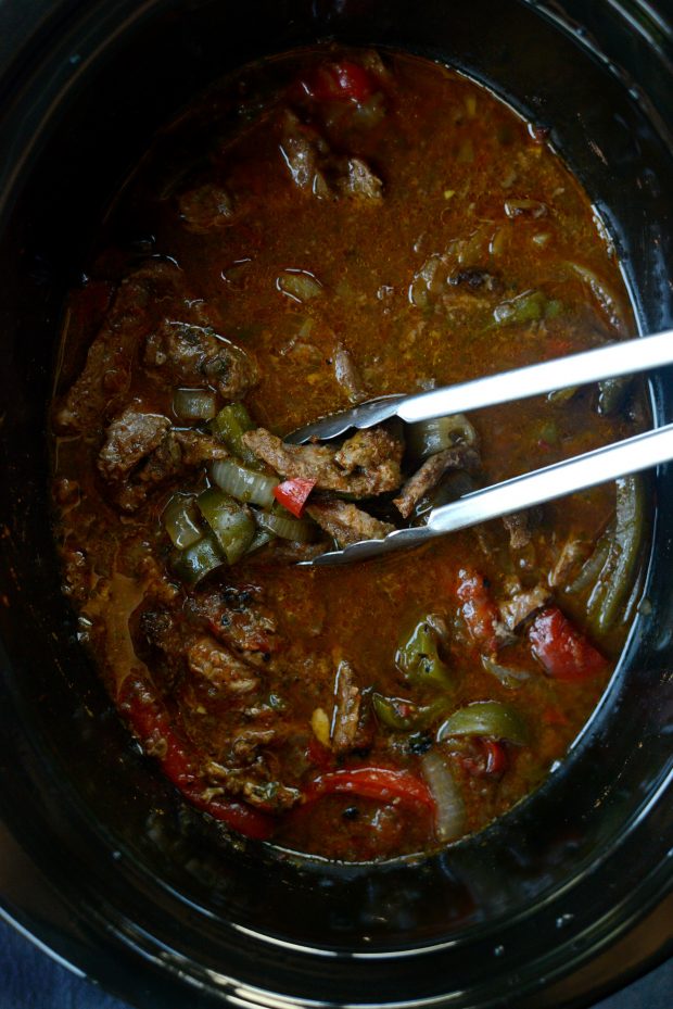 saucy Steak Fajita filling in slow cooker.