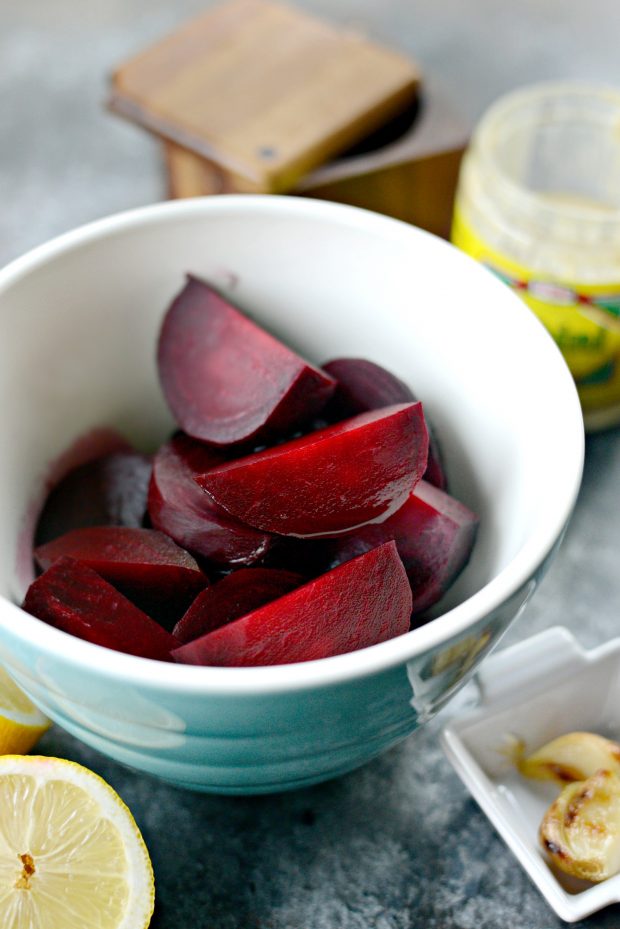 quartered roasted beets in bowl.