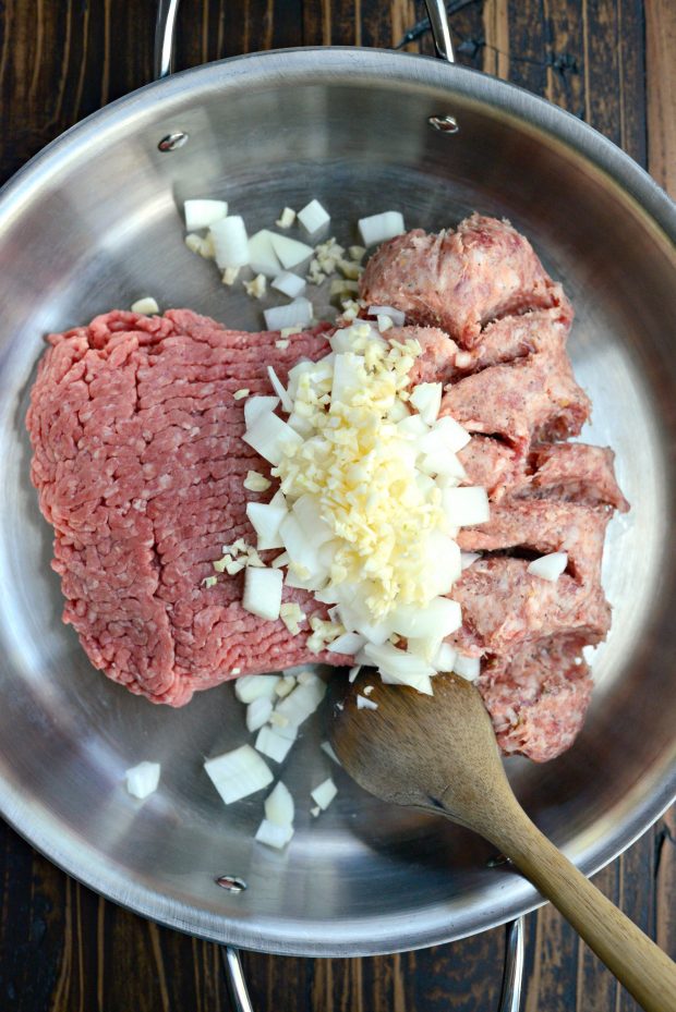 meat, onions and garlic in pan.