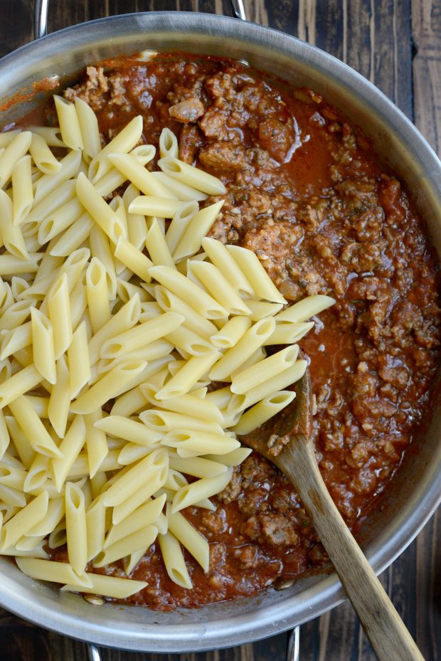 add partially cooked pasta to sauce.