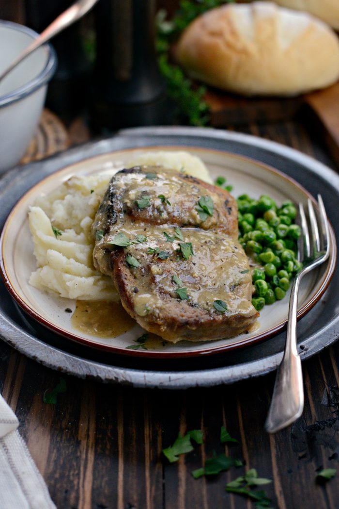 slow cooker pork chops with herb gravy with peas