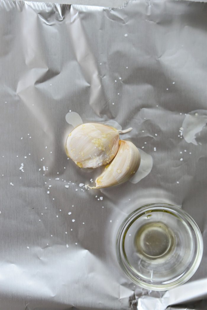 garlic with oil and salt on foil