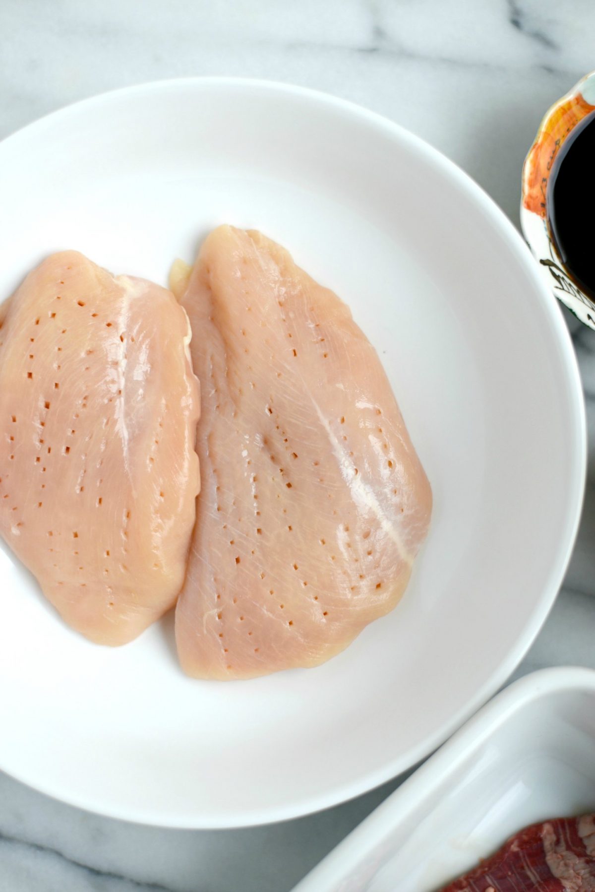 prick chicken breasts with fork