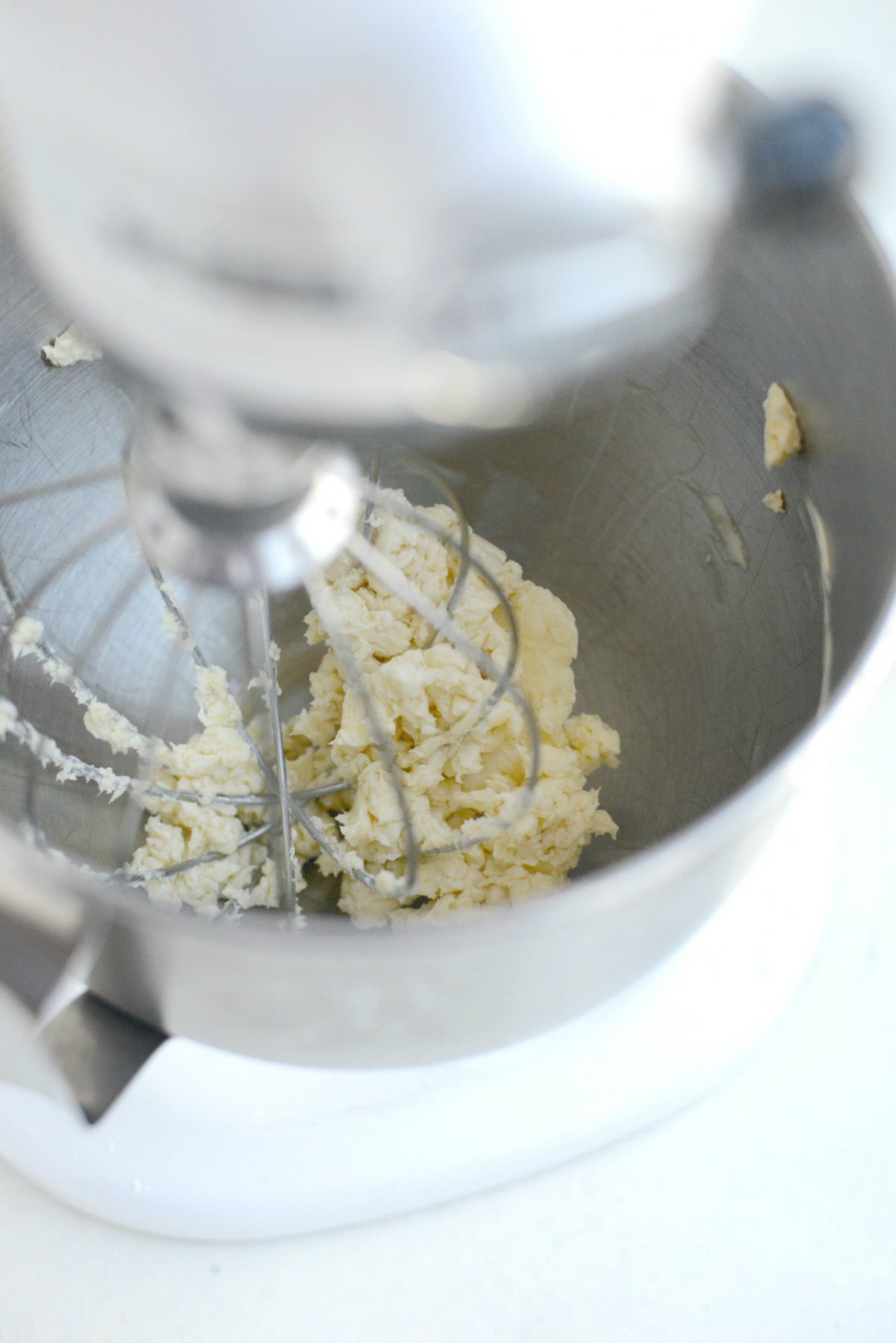 Cream butter until light and fluffy.