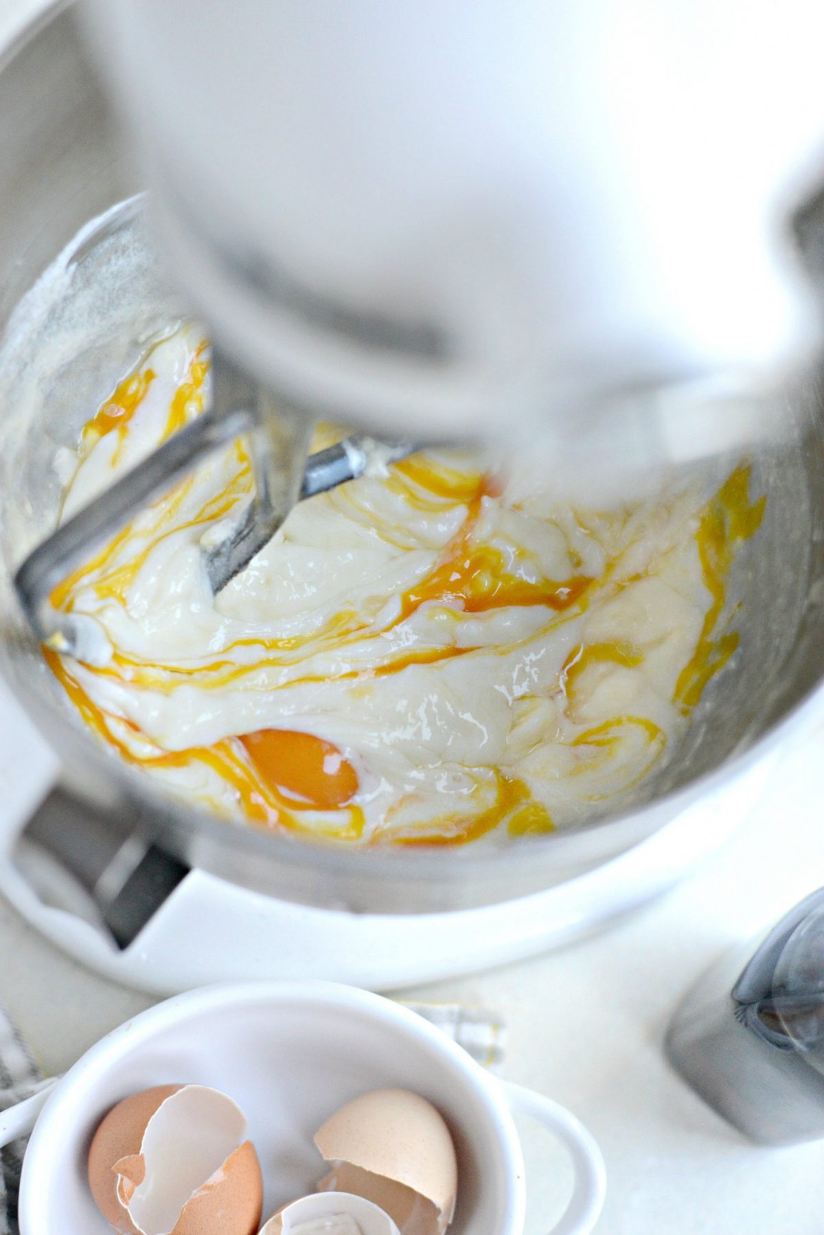 Mix well after each egg before adding vanilla.