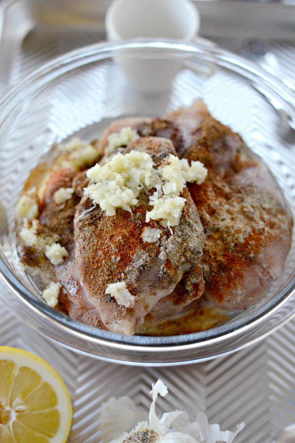 toss chicken with spices and garlic 
