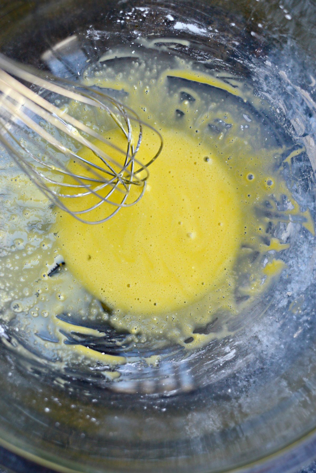 wisk egg yolk with water and cornstarch.