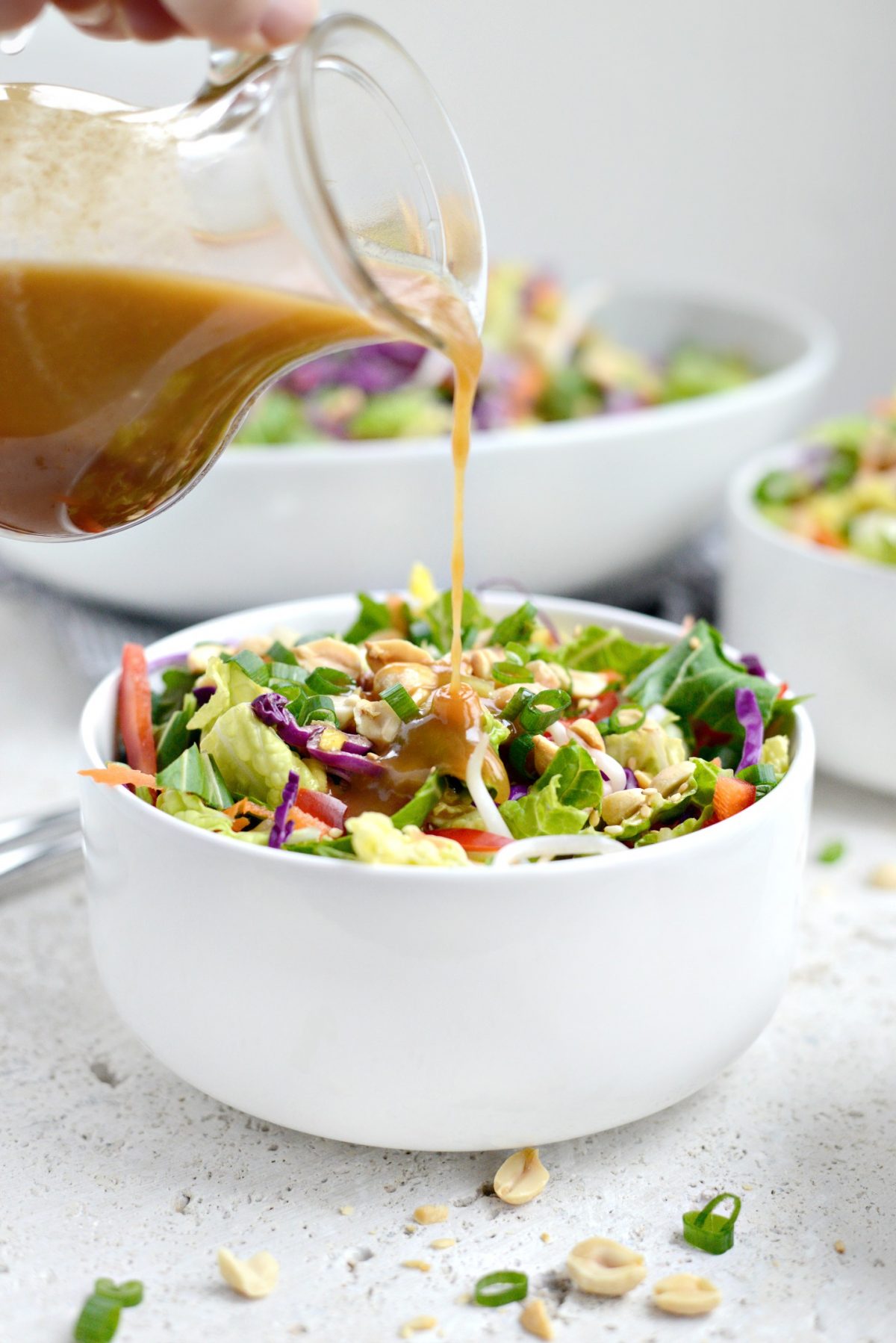 Crunchy Asian Veggie Salad drizzled with dressing