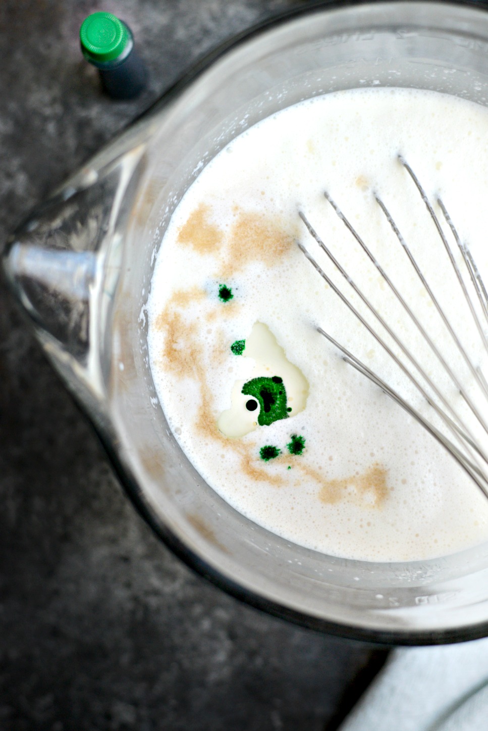 add vanilla, peppermint extract and food coloring