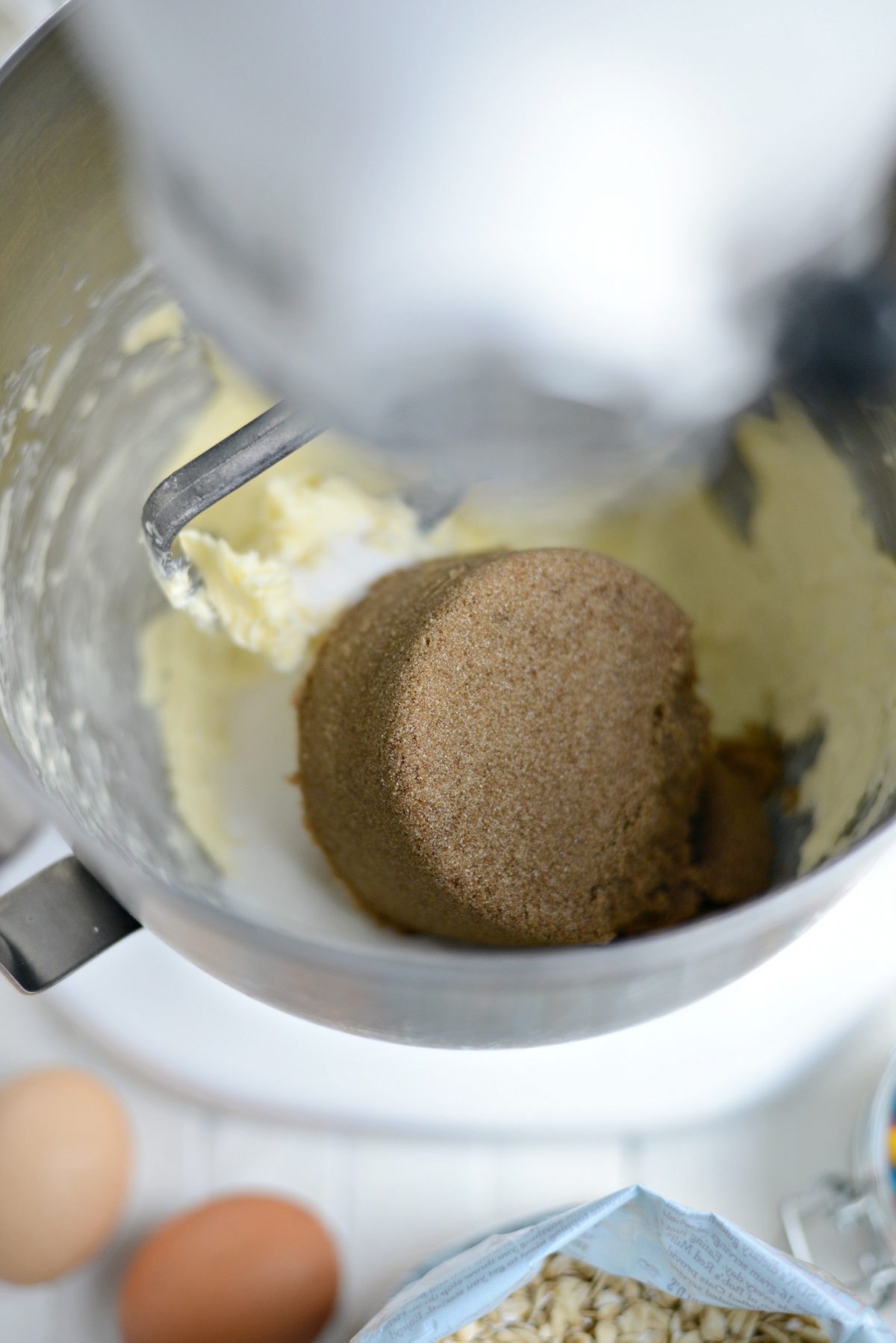 butter and sugars in bowl of stand mixer.