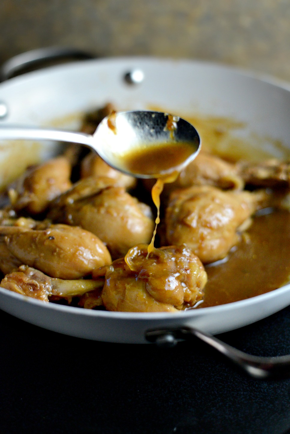 Spoon sauce over chicken as it cooks.