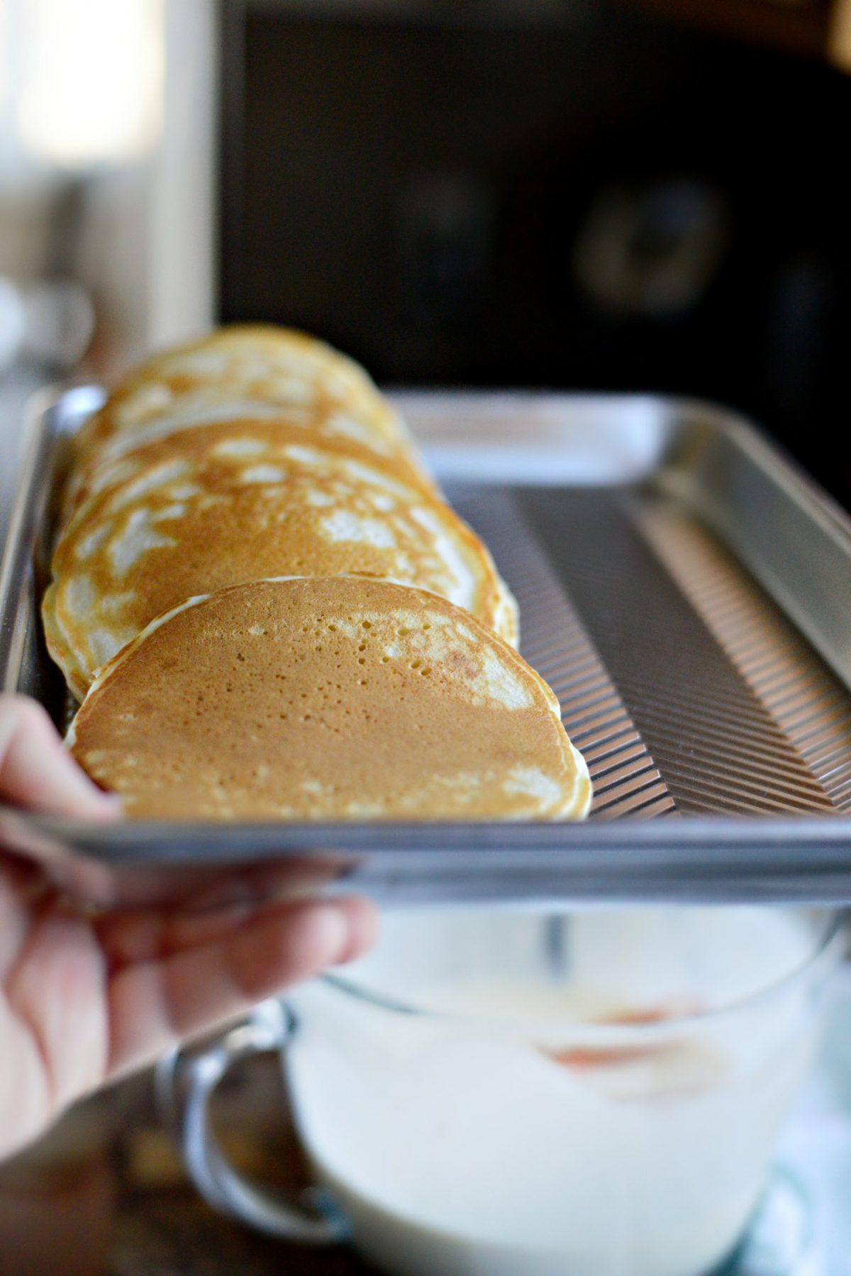 transfer pancakes to rimmed baking pan and keep warm in a low oven.