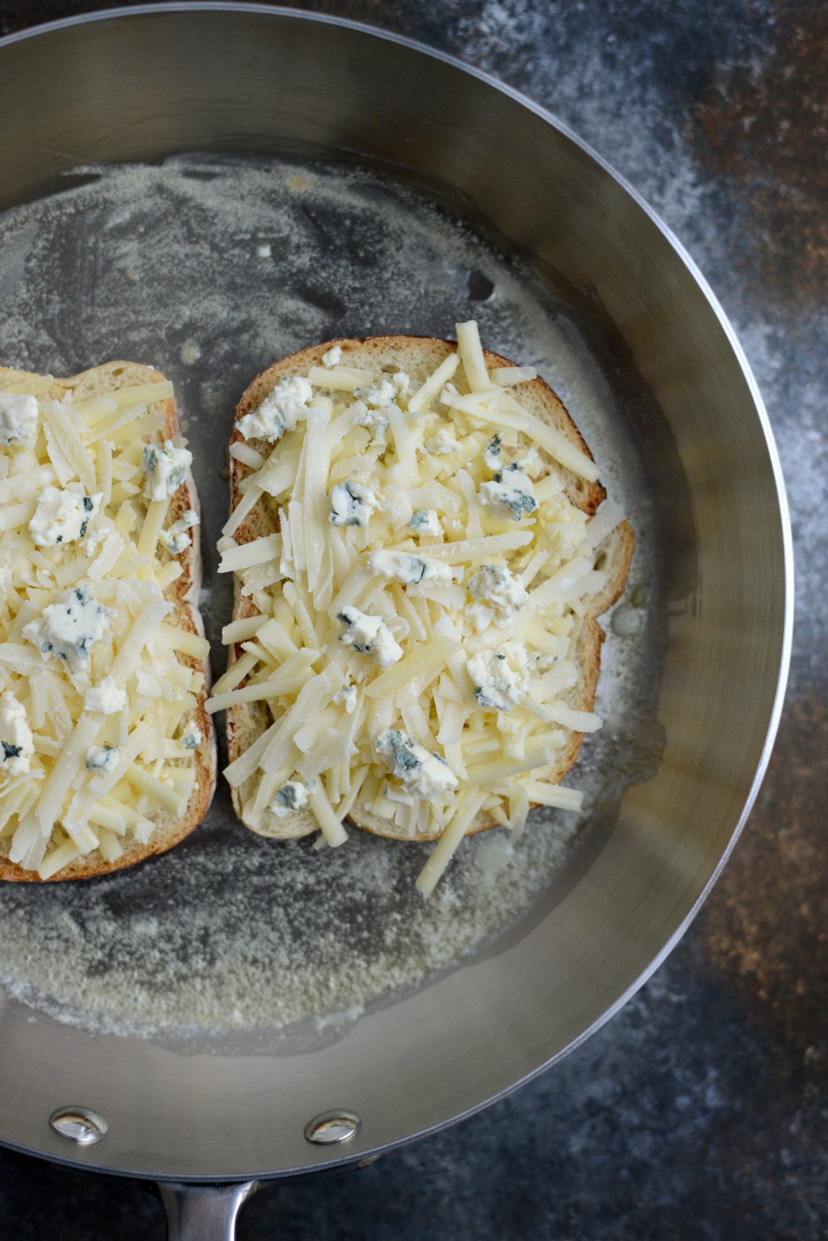 making grilled cheese in skillet