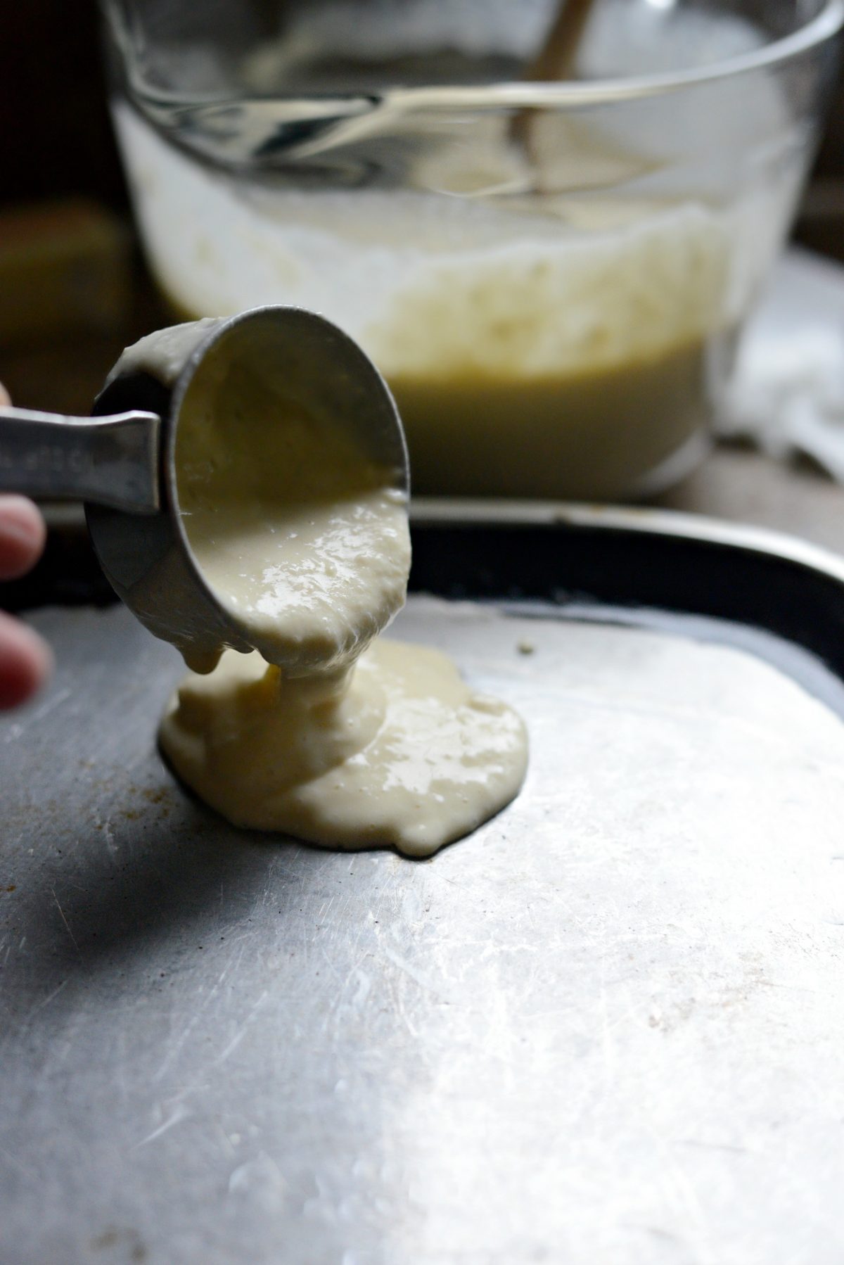 pour pancake batter on griddle