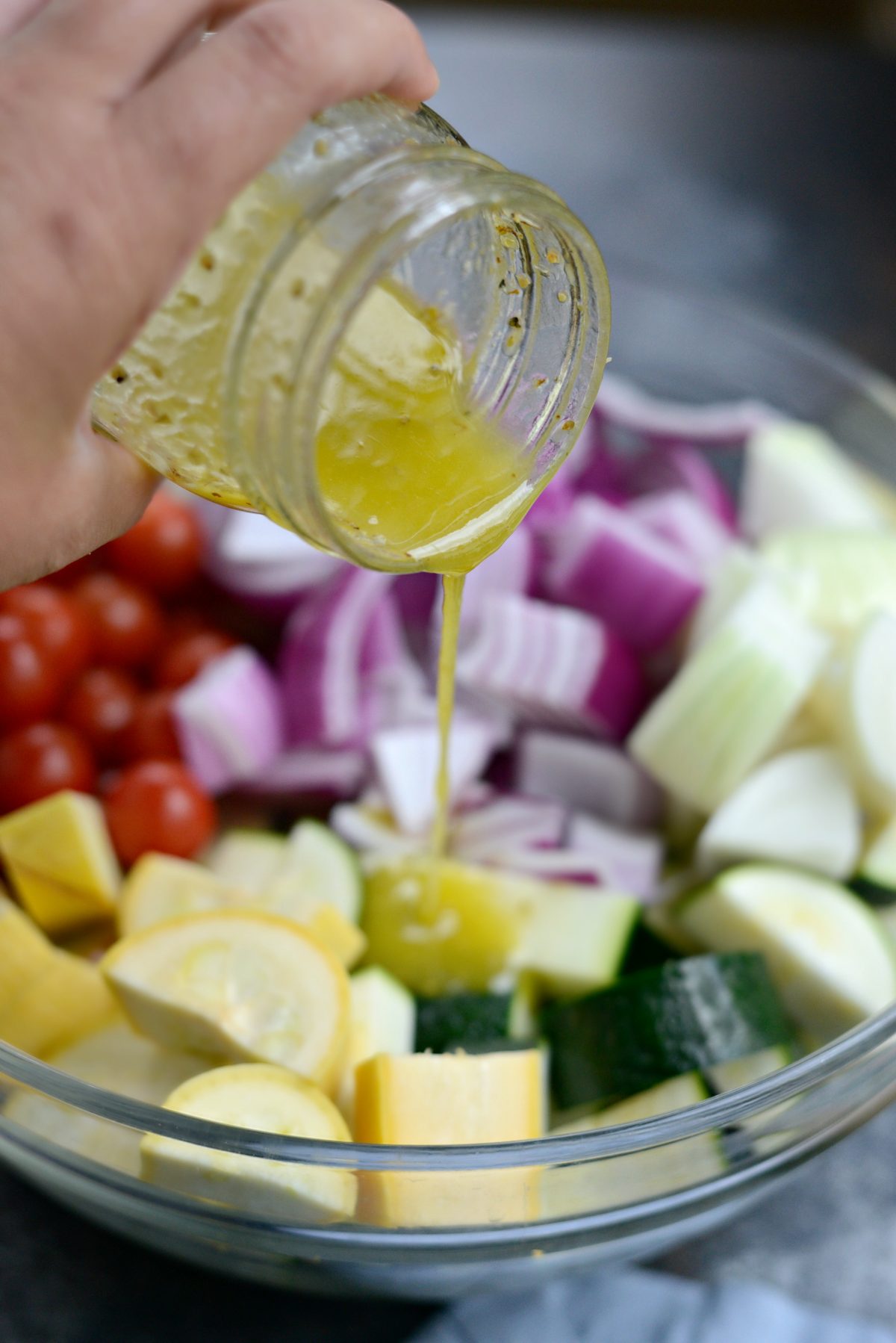 pouring marinade / dressing