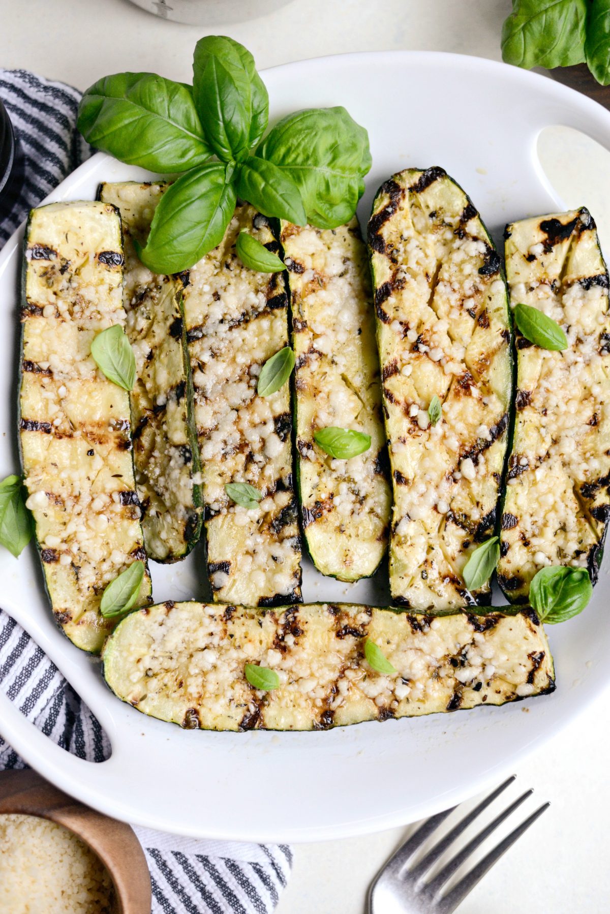 Grilled Zucchini with Lemon, Garlic & Parmesan with fresh basil