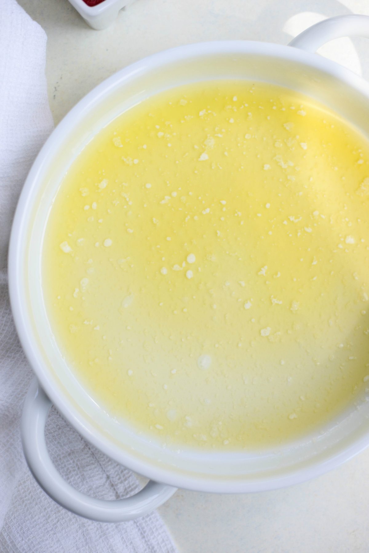 melted butter in baking dish.