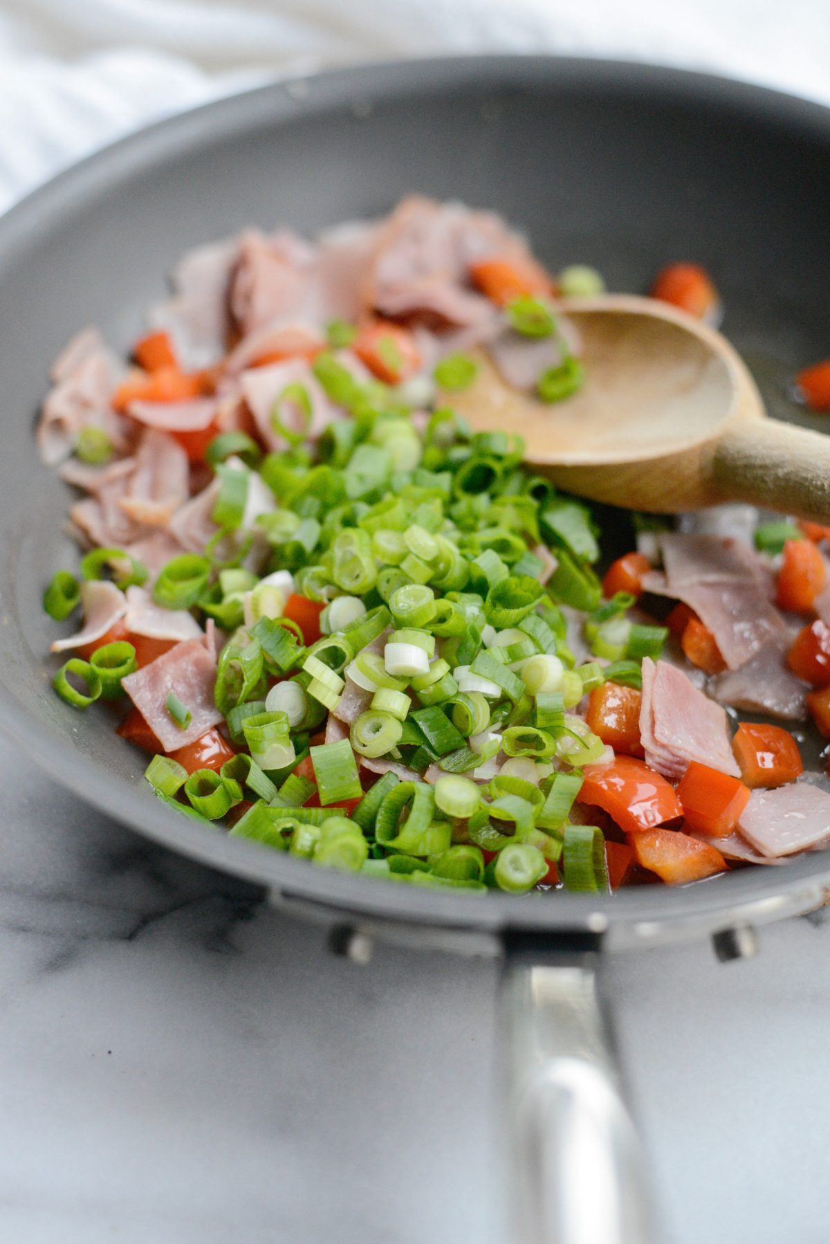 saute peppers, with ham and onions 