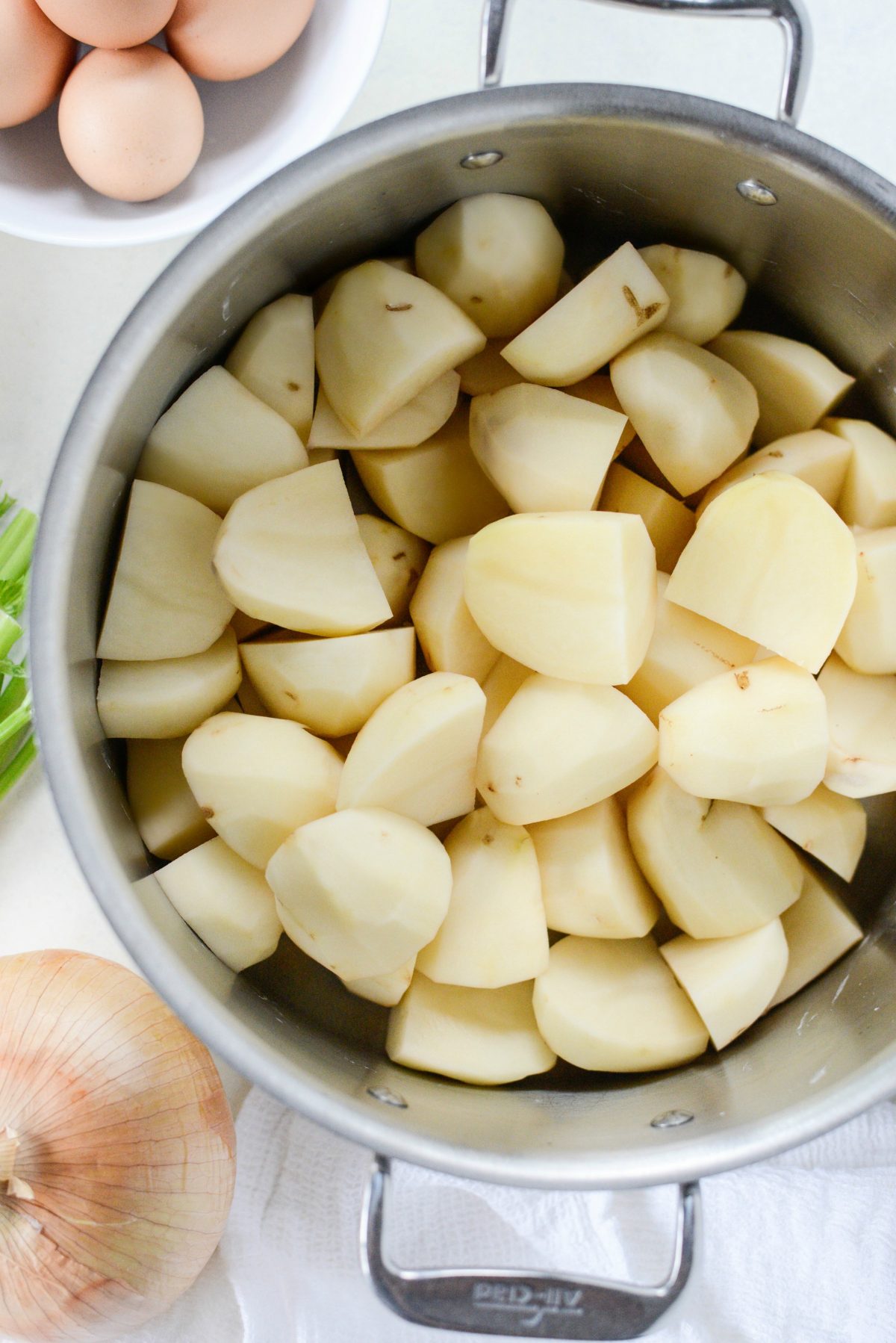 add potatoes to a large pot