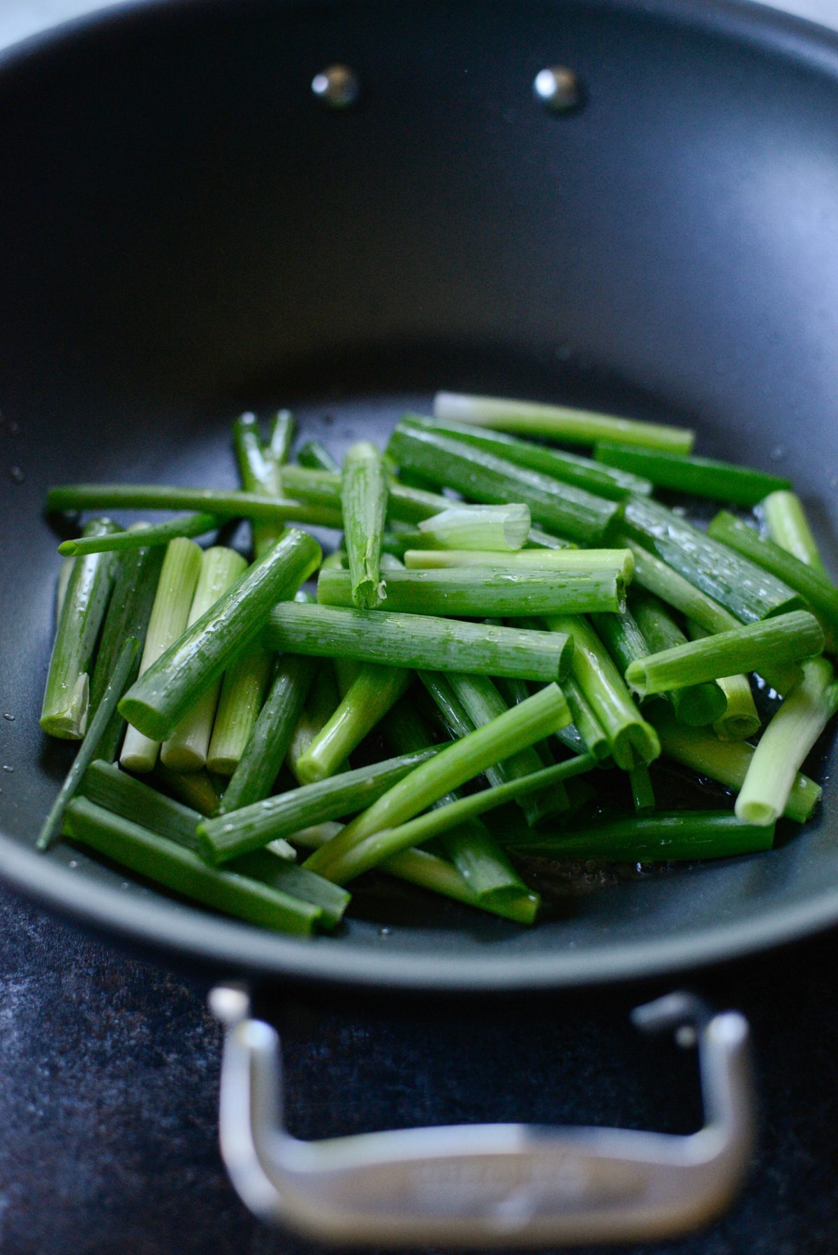 add green onions to pan