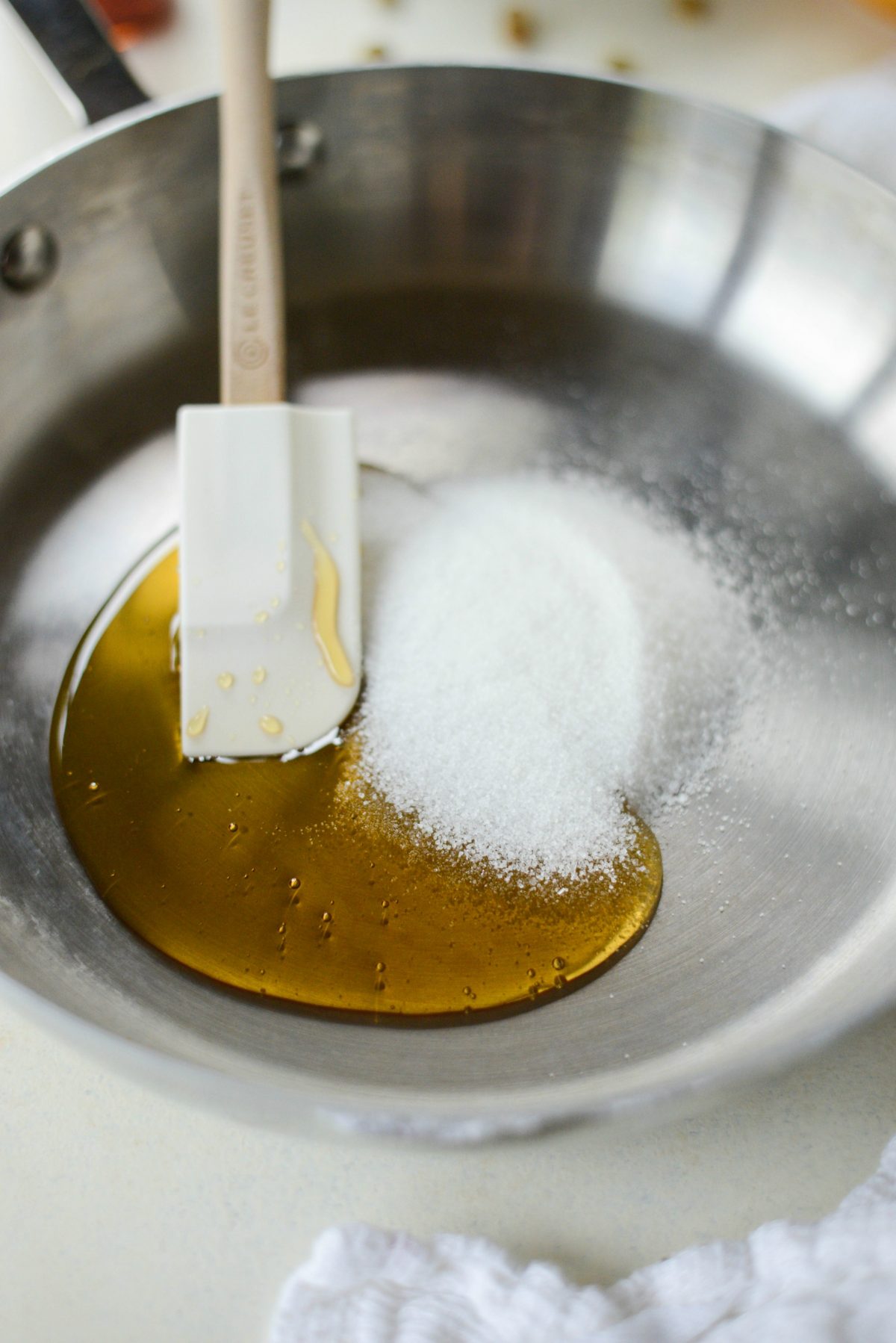 honey and sugar in skillet