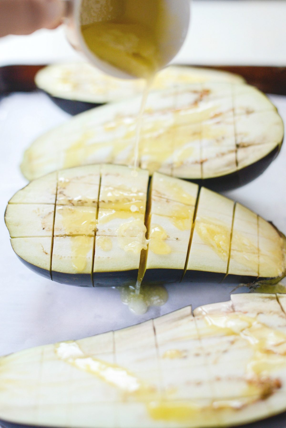 Drizzle butter over eggplant