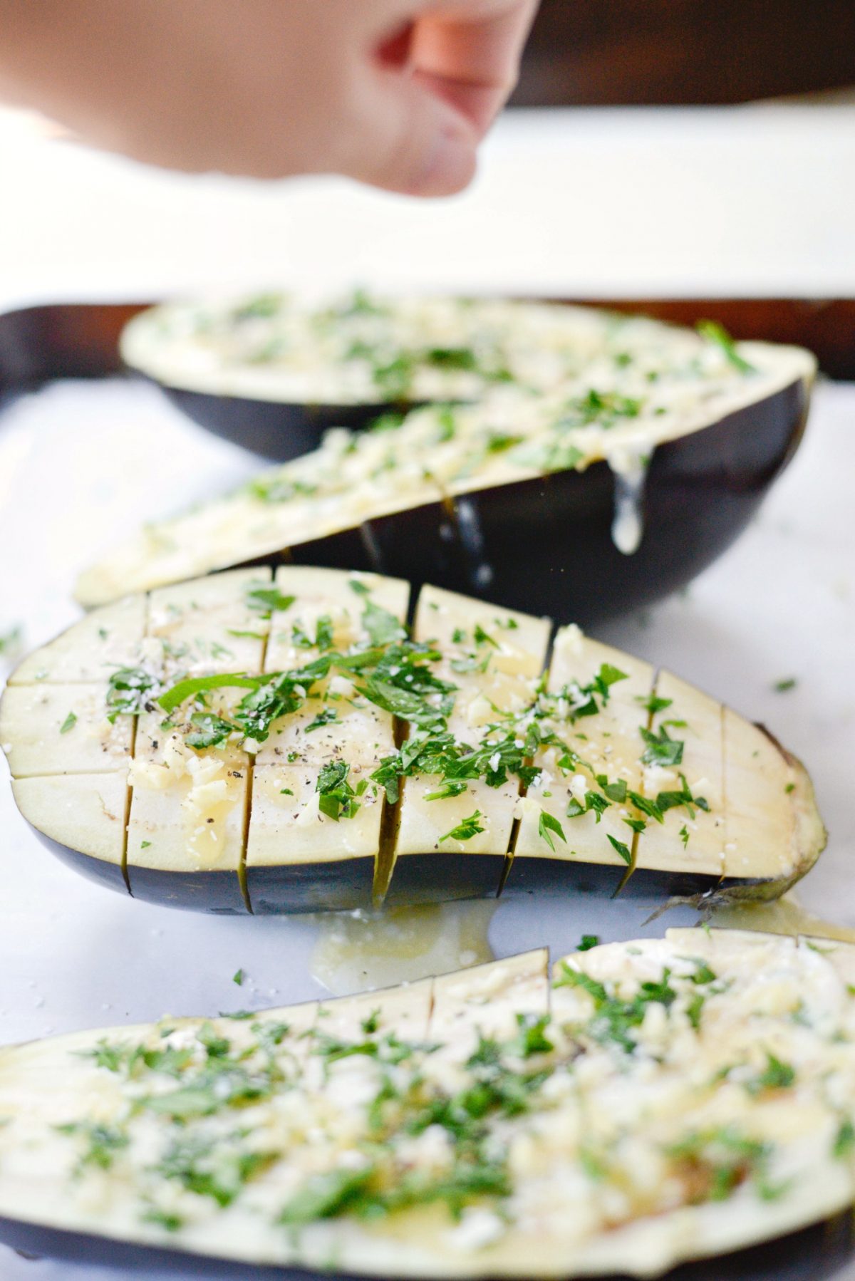 sprinkle eggplant with garlic and herbs