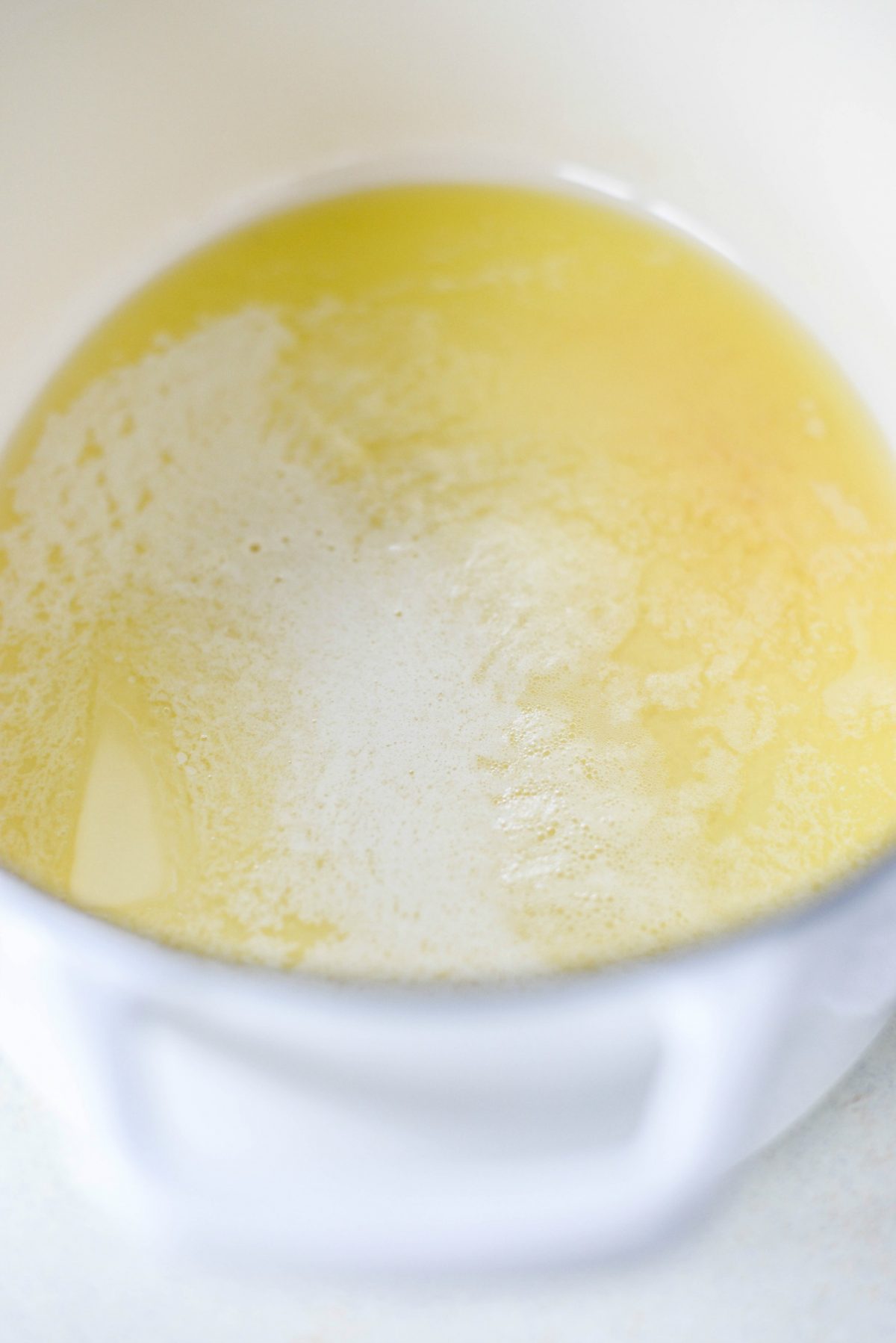 melt butter in a dutch oven.
