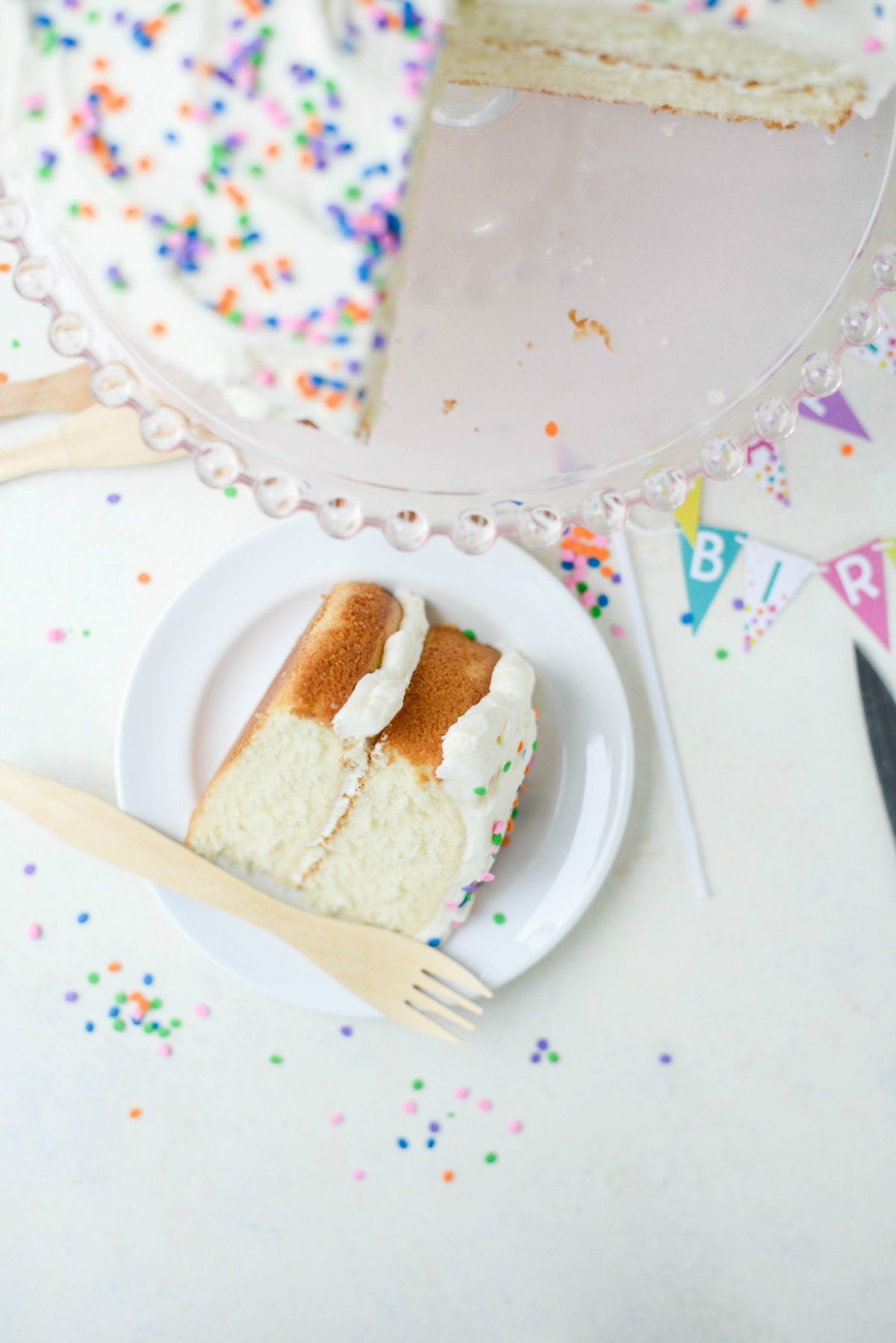 Slice of White Cake with White Buttercream Frosting