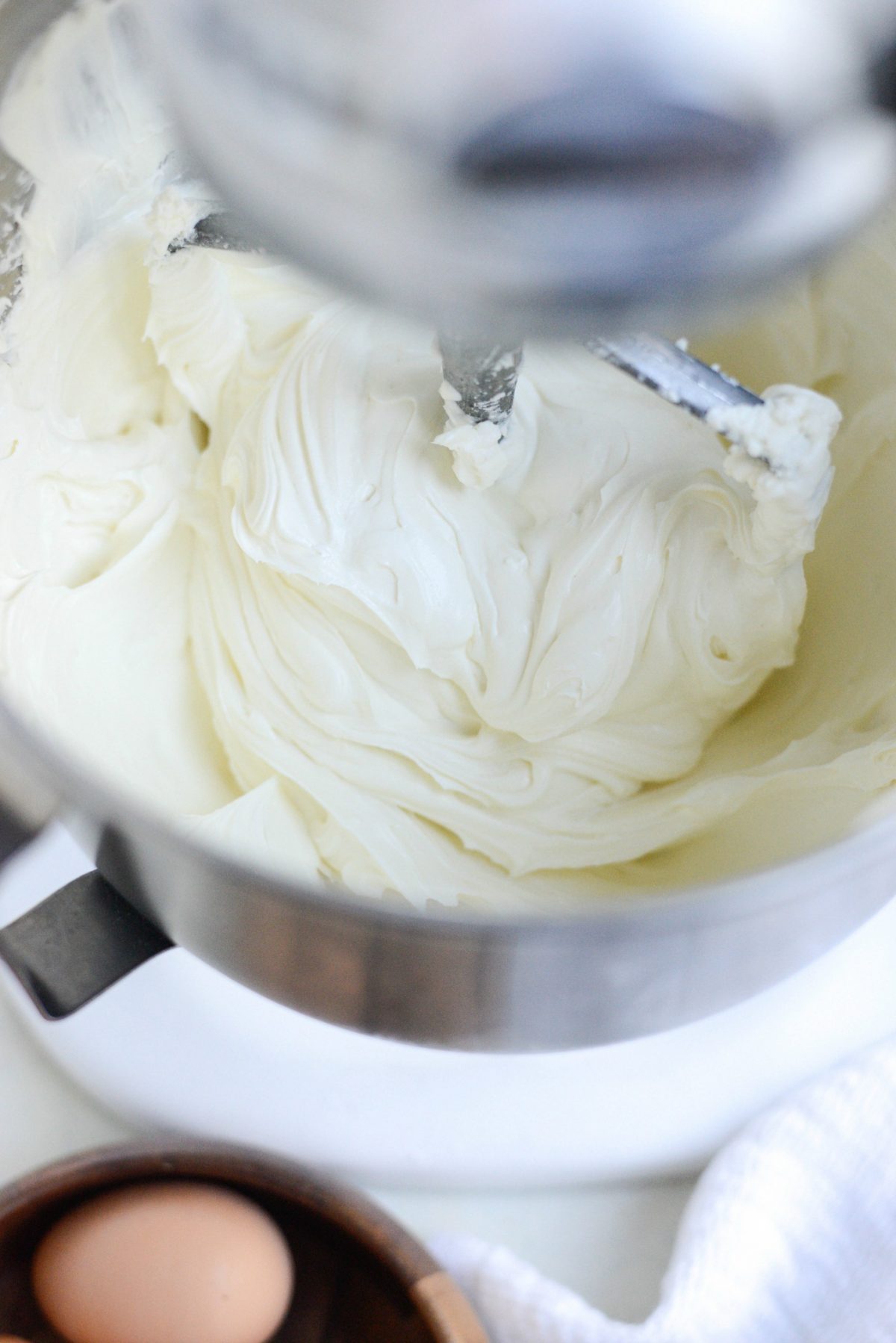 Add sour cream to cream cheese mixture