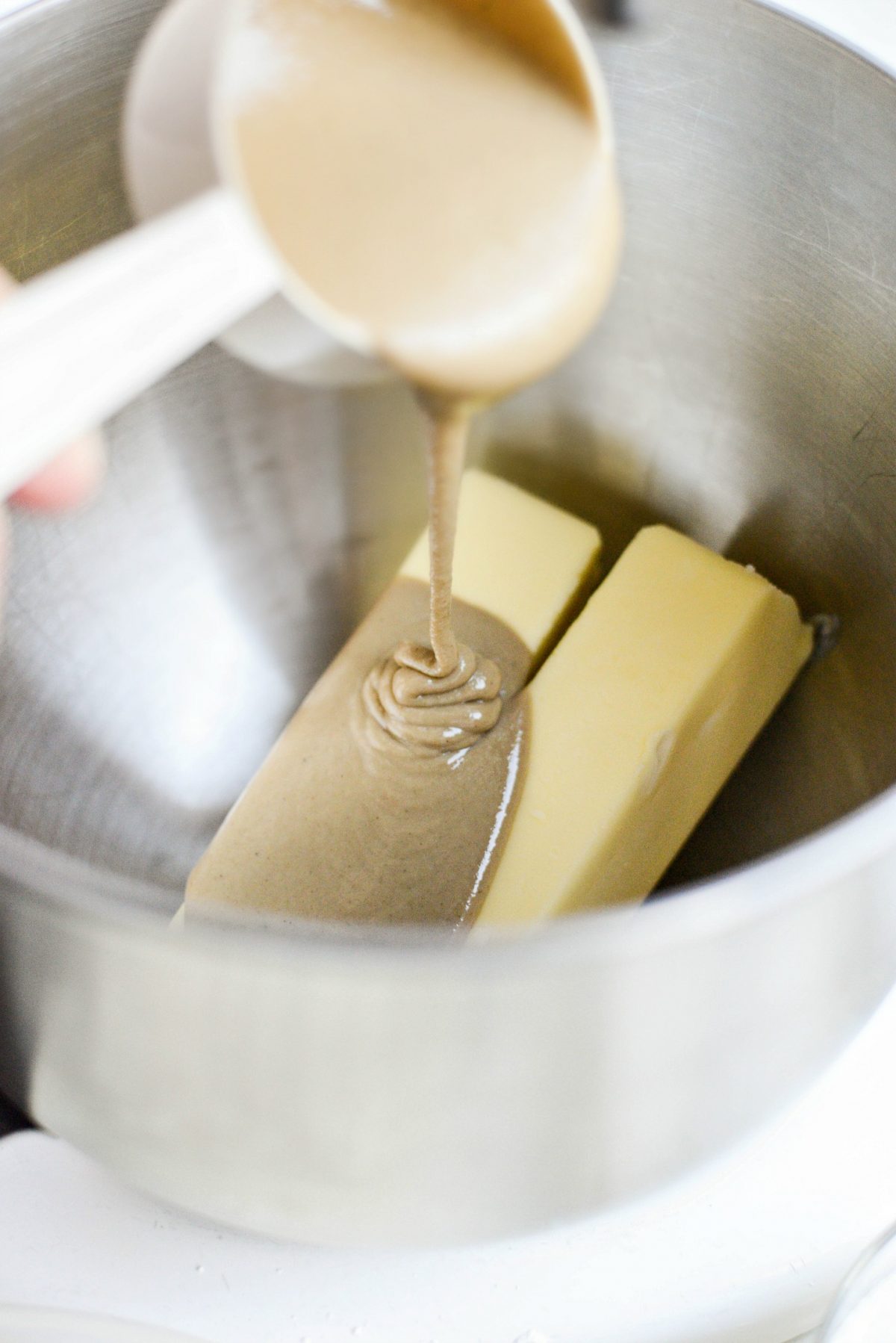 Add butter and tahini into the bowl of your stand mixer