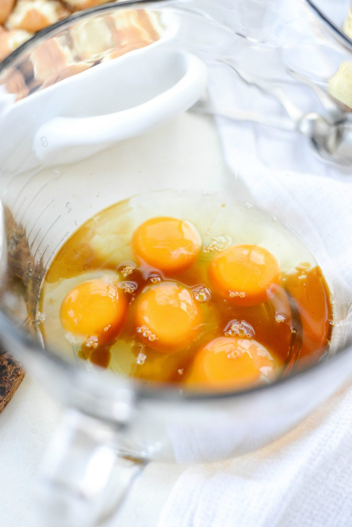 in a mixing bowl add eggs and vanilla.