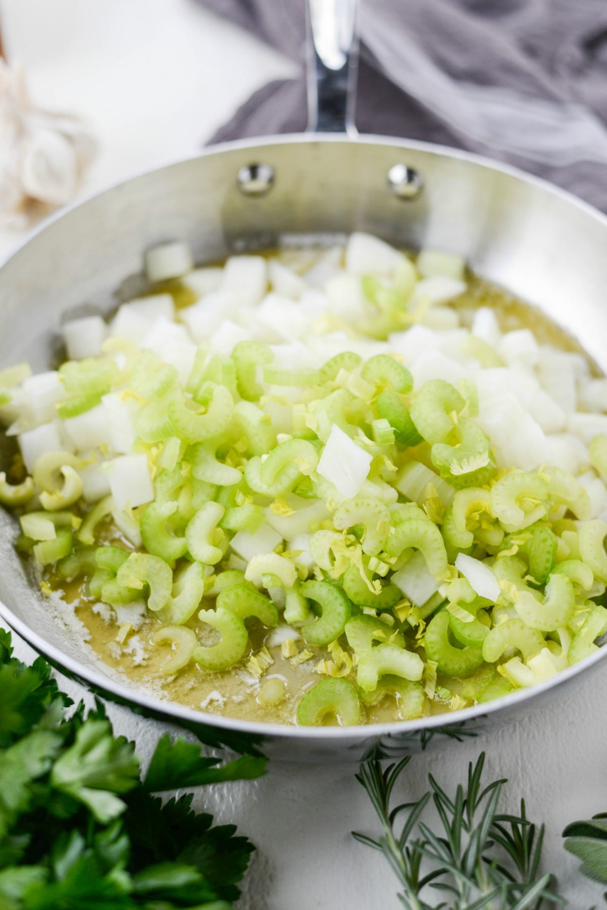 butter, onions and celery in skillet.