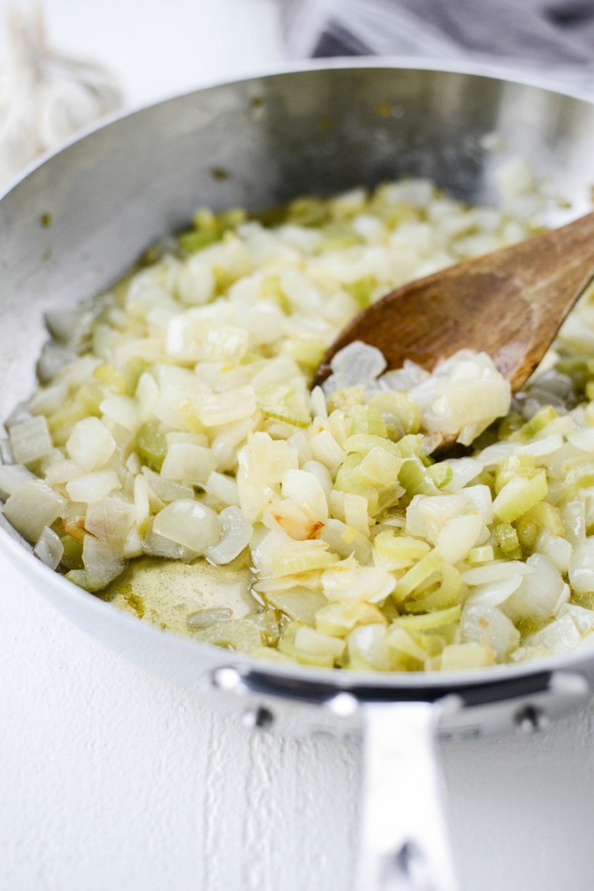 sautéed onions and celery in skillet.