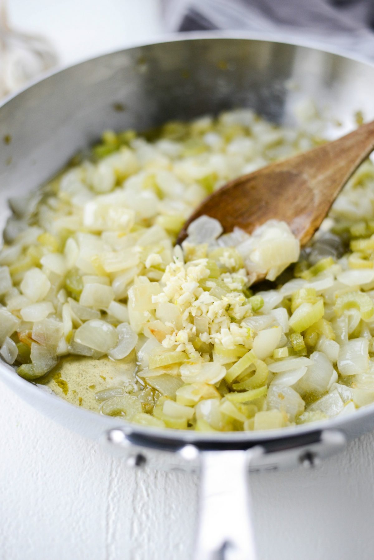 add garlic to sautéed onions and celery.